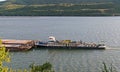 Drobeta Turnu Severin, Romania. August, 13, 2019- A ship pushes barges to shore on the Danube. The picture taken on the shore Royalty Free Stock Photo