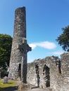 Drogheda, IRELAND - August 5h, 2019: Celtic High Cross in the historic ruins of Monasterboice, an early Christian settlement near Royalty Free Stock Photo