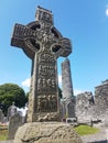 Drogheda, IRELAND - August 5h, 2019: Celtic High Cross in the historic ruins of Monasterboice, an early Christian settlement near Royalty Free Stock Photo