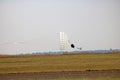 DROGUE CHUTE TRAILING BEHIND HAWK JET AFTER LANDING