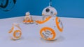 Droid BB-8 from StarWars rolling on white table at robot exhibition