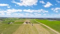 Drone aerial views of rows of grapevines and scenic landscape