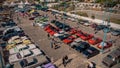 drone aerial high angle photo of colourful car expo in Ayia Napa cyprus