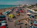 drone aerial high angle photo of colourful car expo in Ayia Napa cyprus