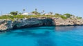 Drone aerial landscape of the beautiful bay of Cala Anguila with a wonderful turquoise sea, Porto Cristo, Majorca Royalty Free Stock Photo