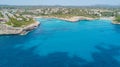 Drone aerial landscape of the beautiful bay of Cala Mandia and Anguila with a wonderful turquoise sea, Porto Cristo, Majorca Royalty Free Stock Photo