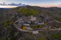 Drone aerial panorama of Termas Radium Hotel Serra da Pena at sunset in Sortelha, Portugal