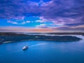 Drone Aerial view of Sydney Harbour Sydney CBD NSW Australia. cloudy dark skies, clear turquoise waters. Royalty Free Stock Photo