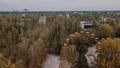 Drone aerial photo of the abandoned amusement attraction park with feris wheel at Pripyat ghost town Royalty Free Stock Photo