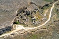 Drone aerial scenery of person walking in the rural road. Adventure exploration. Walking in nature. People active