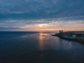 Drone aerial shot of Remains of Reculver church towers at early october sunrise early october sunrise