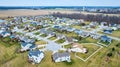 Drone aerial of suburban Midwest American neighborhood houses with ponds and housing addition and cul-de-sac