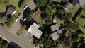 Drone aerial top down view of homes with yards