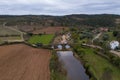 Drone aerial view of an ancient historic stone bridge in Idanha a velha, Portugal Royalty Free Stock Photo