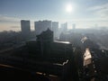 Drone aerial view of Belgrade city in the smog and fog in the morning. Zemun and New Belgrade district, Serbia, Europe. Royalty Free Stock Photo