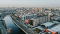 Drone aerial view of buildings and Dambovita River, Bucharest, Romania