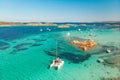 Drone aerial view of catamaran sailing boat in Maddalena Archipelago, Sardinia, Italy.