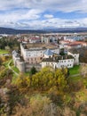 Drone aerial view from east of Zvolen castle during autumn with coloured trees