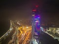 Drone aerial view of Europa Bussines and Shopping center in city of Banska Bystrica during winter evening