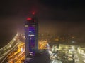 Drone aerial view of Europa Bussines and Shopping center in city of Banska Bystrica during winter evening