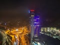 Drone aerial view of Europa Bussines and Shopping center in city of Banska Bystrica during winter evening