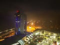 Drone aerial view of Europa Bussines and Shopping center in city of Banska Bystrica during winter evening