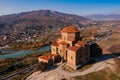 Drone aerial view of Jvari monastery and the mountains in Mtskheta, Georgia Royalty Free Stock Photo