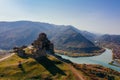 Drone aerial view of Jvari monastery and the mountains in Mtskheta, Georgia Royalty Free Stock Photo