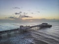 Drone aerial view landscape image of Worthing pier on Sussex coast in England at dawn Royalty Free Stock Photo