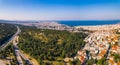 Drone aerial view of port city - Thessaloniki - showing cluttered white houses with orange rooftop. Sunny weather Royalty Free Stock Photo