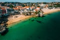 Drone aerial view of Praia da Rainha and Conceicao in Cascais, Portugal