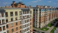 Drone aerial view on residential estate low-rise buildings Opalikha O3, houses, cars, playground. Beautiful countryside architectu