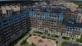 Drone aerial view on residential estate low-rise buildings Opalikha O3, houses, cars, playground. Beautiful countryside architectu