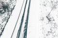 drone aerial view of a road in a snowy landscape, winter time transportation concept Royalty Free Stock Photo