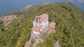 Drone aerial view of the Sanctuary of the Madonna della Ceriola on the top of the Monte Isola island