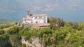 Drone aerial view of the Sanctuary of the Madonna della Ceriola on the top of the Monte Isola island