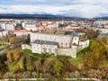 Drone aerial view from south-east of Zvolen castle during autumn with coloured trees
