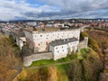 Drone aerial view from south-west of Zvolen castle during autumn with coloured trees