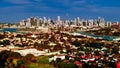 Drone Aerial view of Sydney Harbour Sydney CBD NSW Australia. cloudy dark skies, clear turquoise waters. Royalty Free Stock Photo