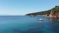 Drone aerial view of tourists enjoying a paradise luxury Yacht trip around Skopelos island, Greece, Aegean Sea, Europe. Royalty Free Stock Photo