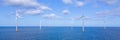 Windmill turbines at sea a huge winmill park in the Netherlands during winter Royalty Free Stock Photo