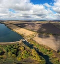 Drone arial view Ukrainian open spaces, dam on the river. Reservoir. Pond. Drone arial view Ukrainian open spaces. Lakes, water