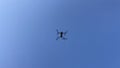 Drone flying against blue sky. 4k video