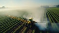 Drone Captured High Angle View Of Tractor Spraying Fertilizer