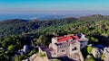 Drone circling Peninha Sanctuary on the top of the cliff at Sintra Cascais Natural Park, Portugal