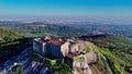 Drone circling Peninha Sanctuary on the top of the cliff at Sintra Cascais Natural Park, Portugal