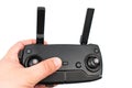 Drone controller with antennas in the hand above white background Royalty Free Stock Photo
