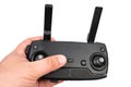 Drone controller with antennas in the hand above white background Royalty Free Stock Photo