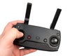 Drone controller with antennas in the hand above white background Royalty Free Stock Photo