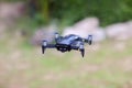Drone copter flying with digital camera.Drone with high resolution digital camera. Flying camera take a photo and video.T Royalty Free Stock Photo
